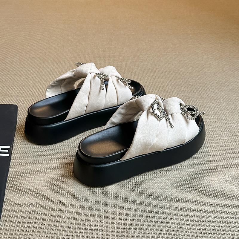 Sweet slippers women's outer wear summer new fashion thick-bottomed beach one-word bow flat-bottomed sandals