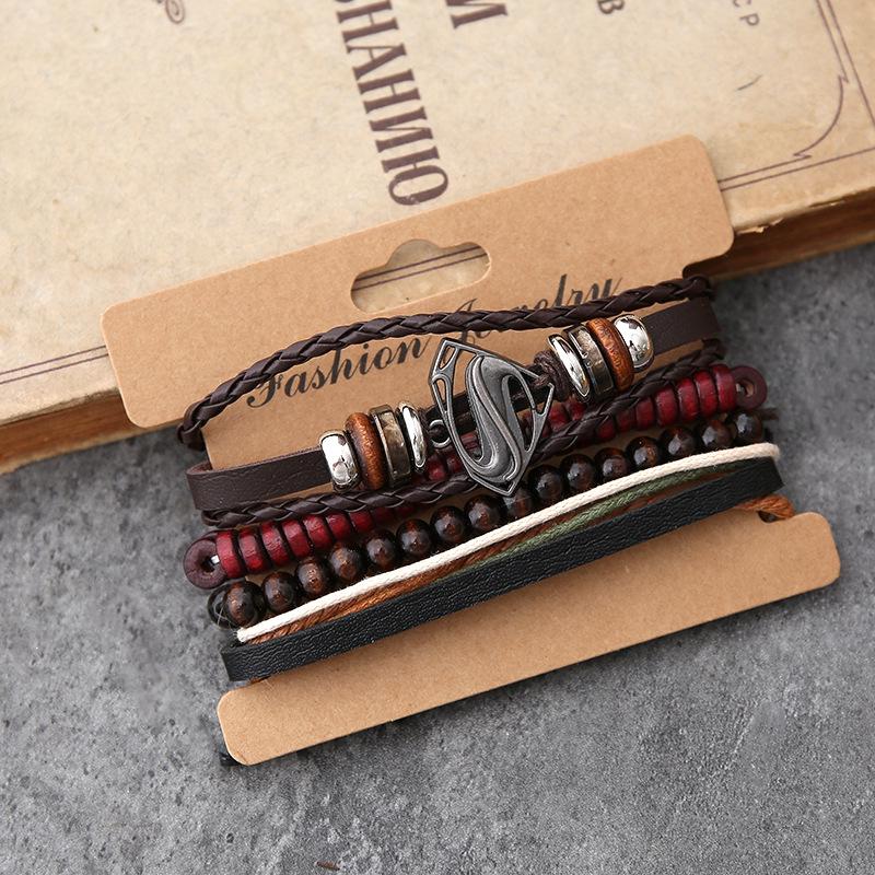 Europäisches & Amerikanisches Retro Feder Gewebtes Lederarmband mit Superman Accessoires - Herren Vierer-Set