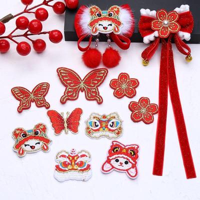 Chinese New Year Lion Baby Cloth Sticker with Gold Embroidery & Butterfly Bow Hair Clip Material