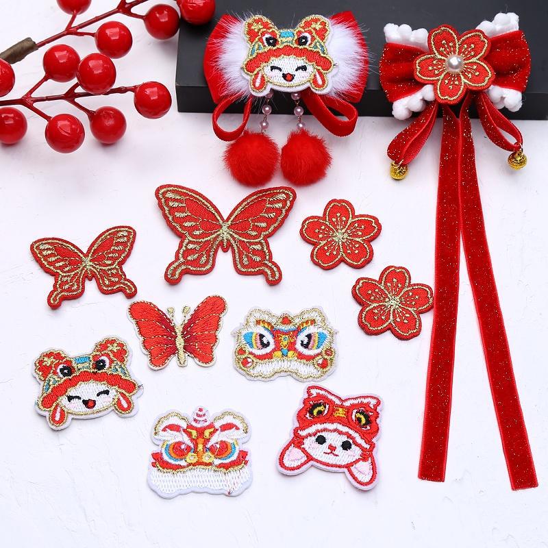 Chinese New Year Lion Baby Cloth Sticker with Gold Embroidery & Butterfly Bow Hair Clip Material