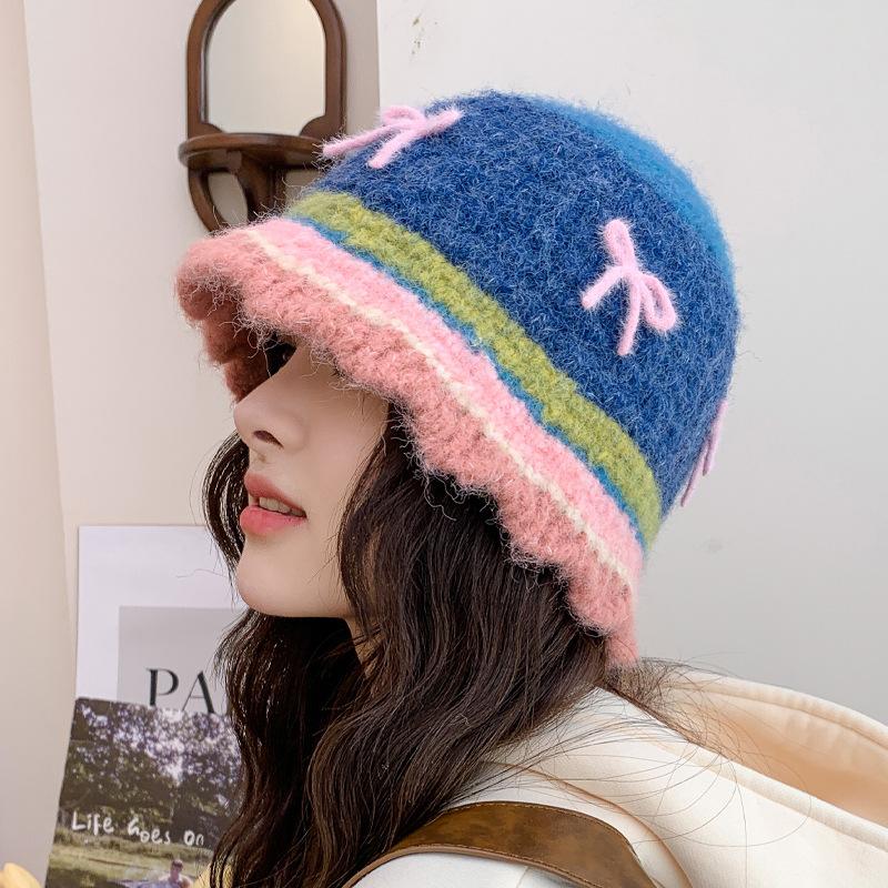 

Autumn and winter knitted hat hat warm wool hat cute bow plush versatile ear protector basin hat хакі