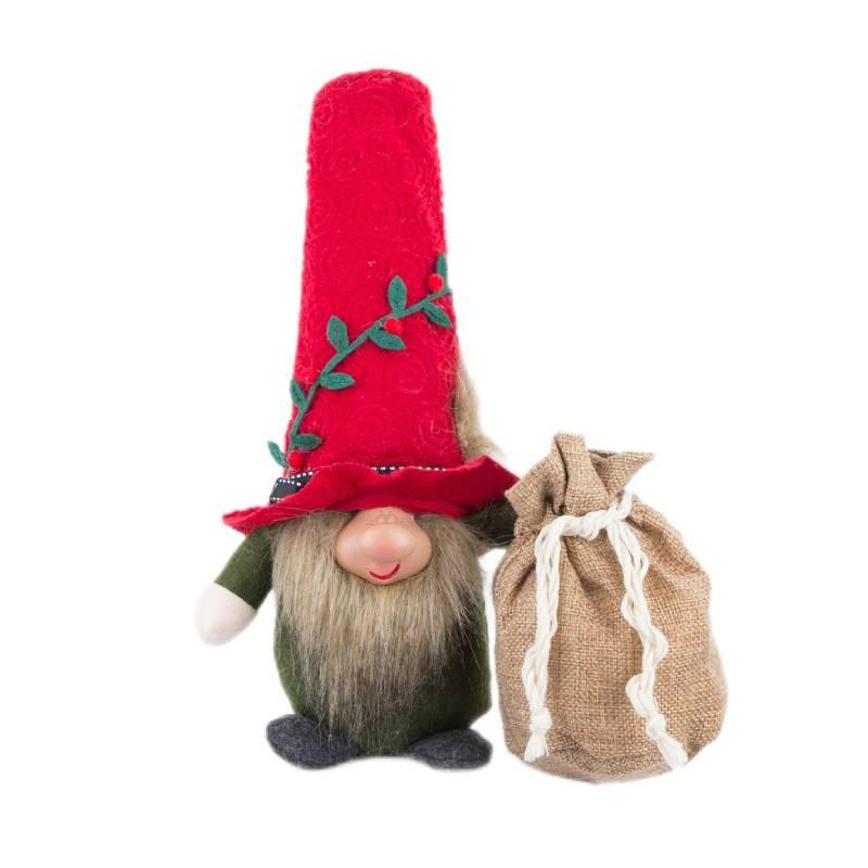 Причудливый рождественский подарочный мешок, украшенный безликой куклой и шапкой эльфа красный