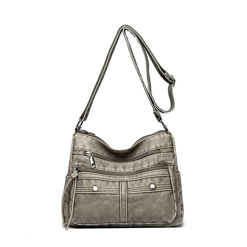 Fashion trend shoulder bag popular new multi-layer messenger bag splicing large-capacity commuter women's bag