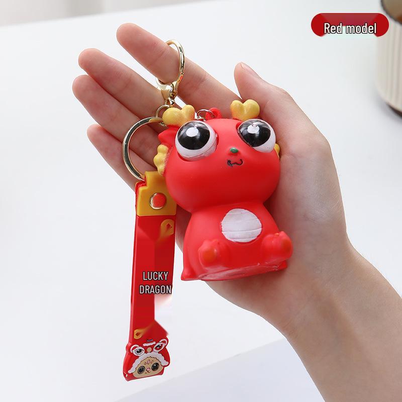 Exploding Eye Dragon Keychain: Squishy Stress Relief Toy and Pendant
