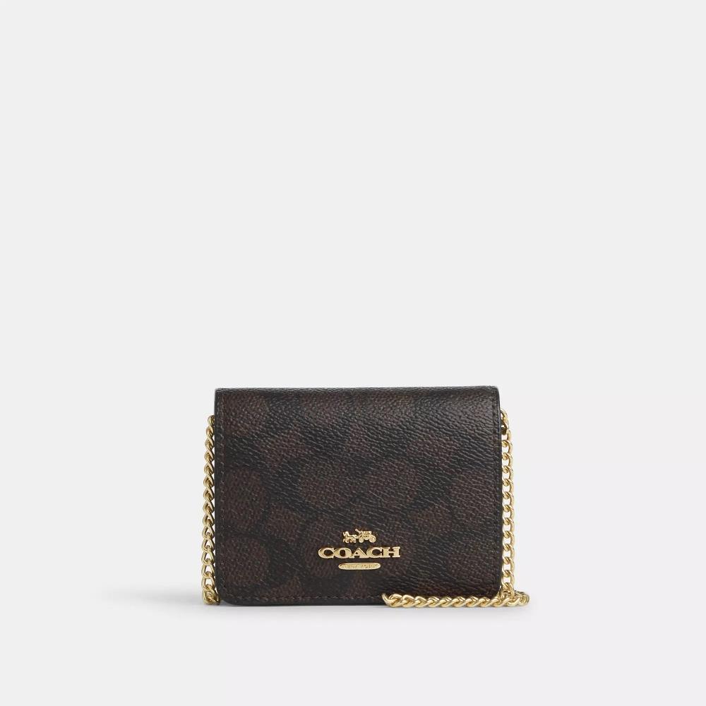

CoAch MIni WAllet On A chAIn In signAture cAnvAs Gold wAlnut blAck One Size