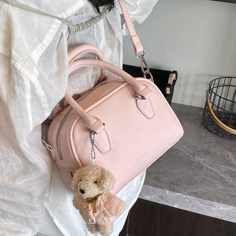 Spring Korean Version of Simple Fashion Texture Portable Bowling Women's Bag Casual Versatile Foreign Style Niche Design Messenger Bag
