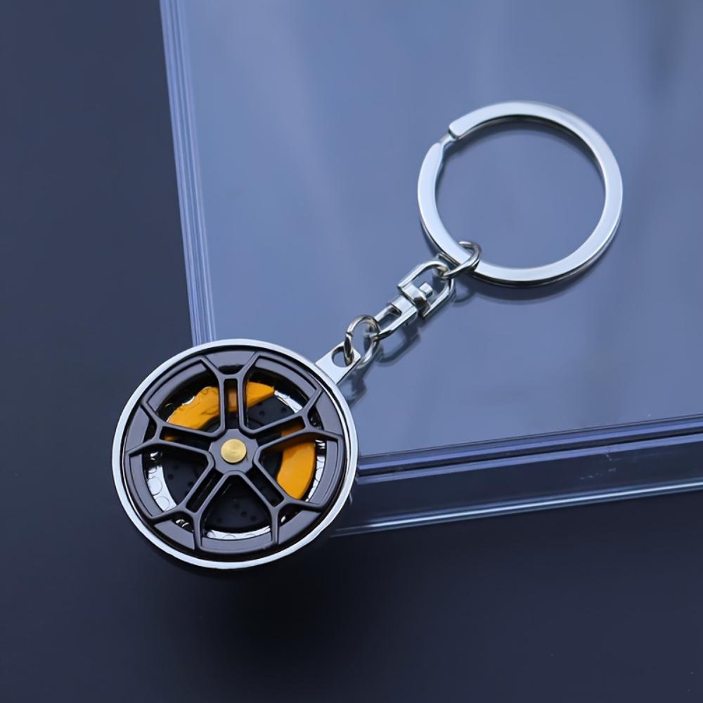 Metallbremsradnabe drehen integrierte Pistole schwarzer Schlüsselanhänger Weihnachtsgeschenk Mercedes-Benz Radnaben-Bremssattel-Schlüsselanhänger