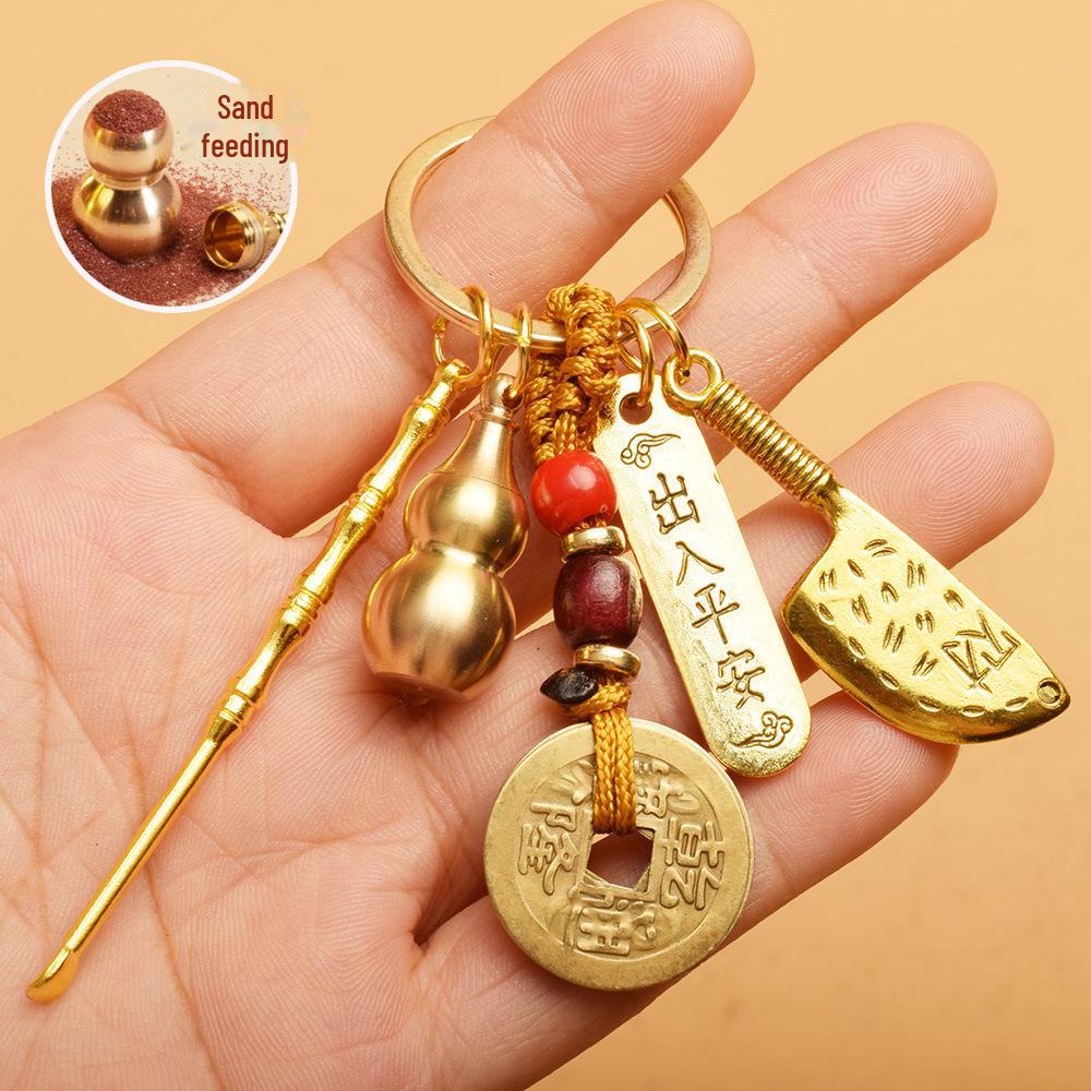 

Брелок-амулет: Монети п яти імператорів, гарбуз, абак, вежа Веньчан, мішок з грошима, Будда, совок, ложка для вух, кулон Мальовнича місцевість