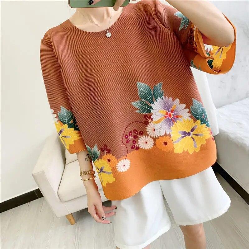 Nové plisované top pro ženy s kulatým výstřihem, zeštíhlující a přiléhavého střihu, volné a stylové, všestranné tištěné ležérní tričko