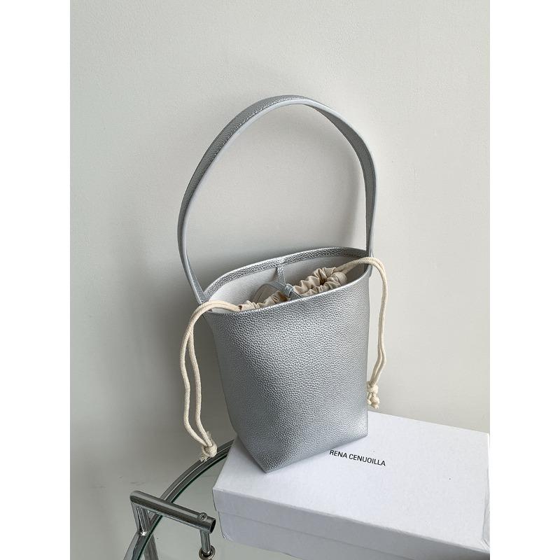 

Cylinder bucket bag women s large-capacity portable shoulder bag women s simple leather underarm bag women срібний