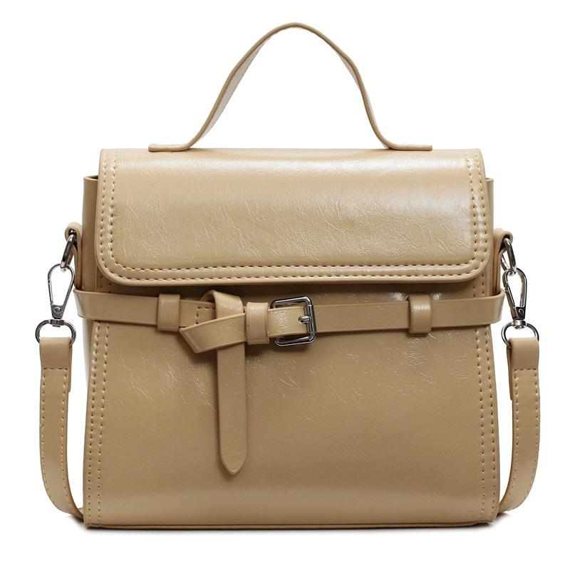 Trend niche high-end sense solid color versatile portable small square bag women's commuting simple oil wax leather messenger bag