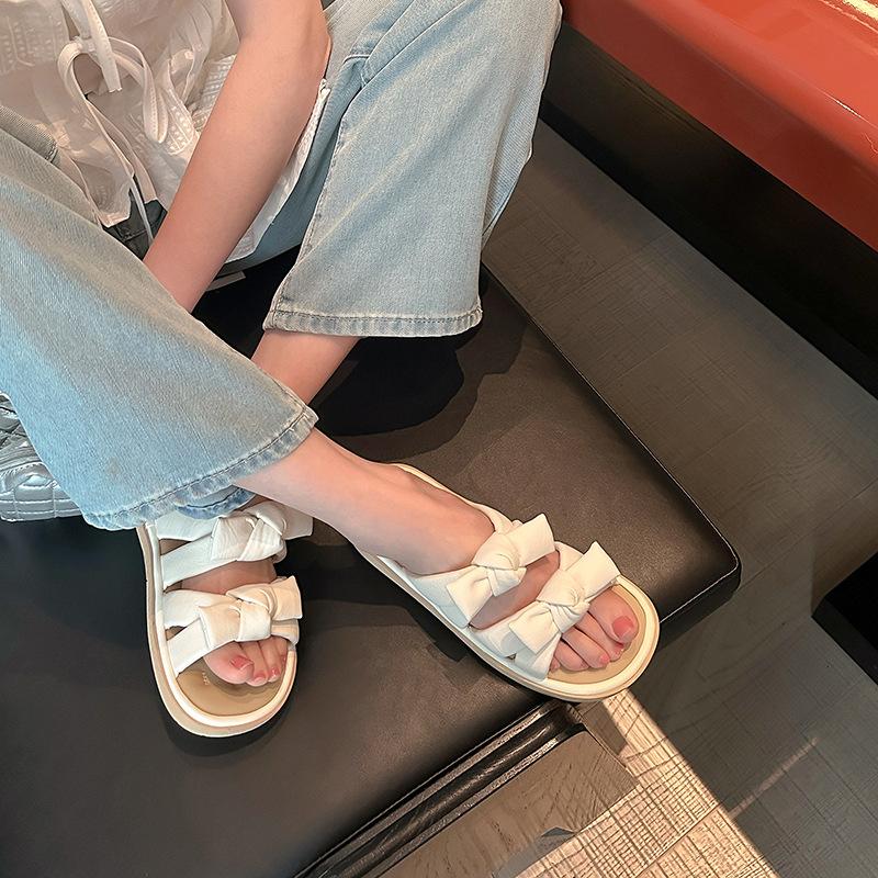 Soft-soled slippers women s summer summer new flat-bottomed versatile casual bow one-word drag 35