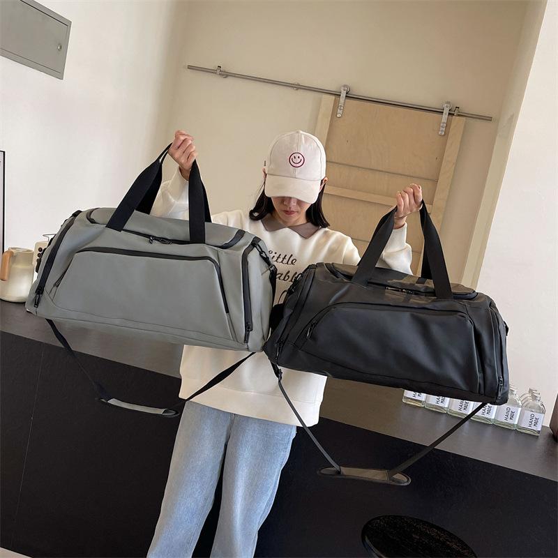 Travel Bag Large Capacity Waterproof Short-distance Portable Duffel Bag Storage Business Trip Boarding Bag Premium Sense Messenger Fitness Bag