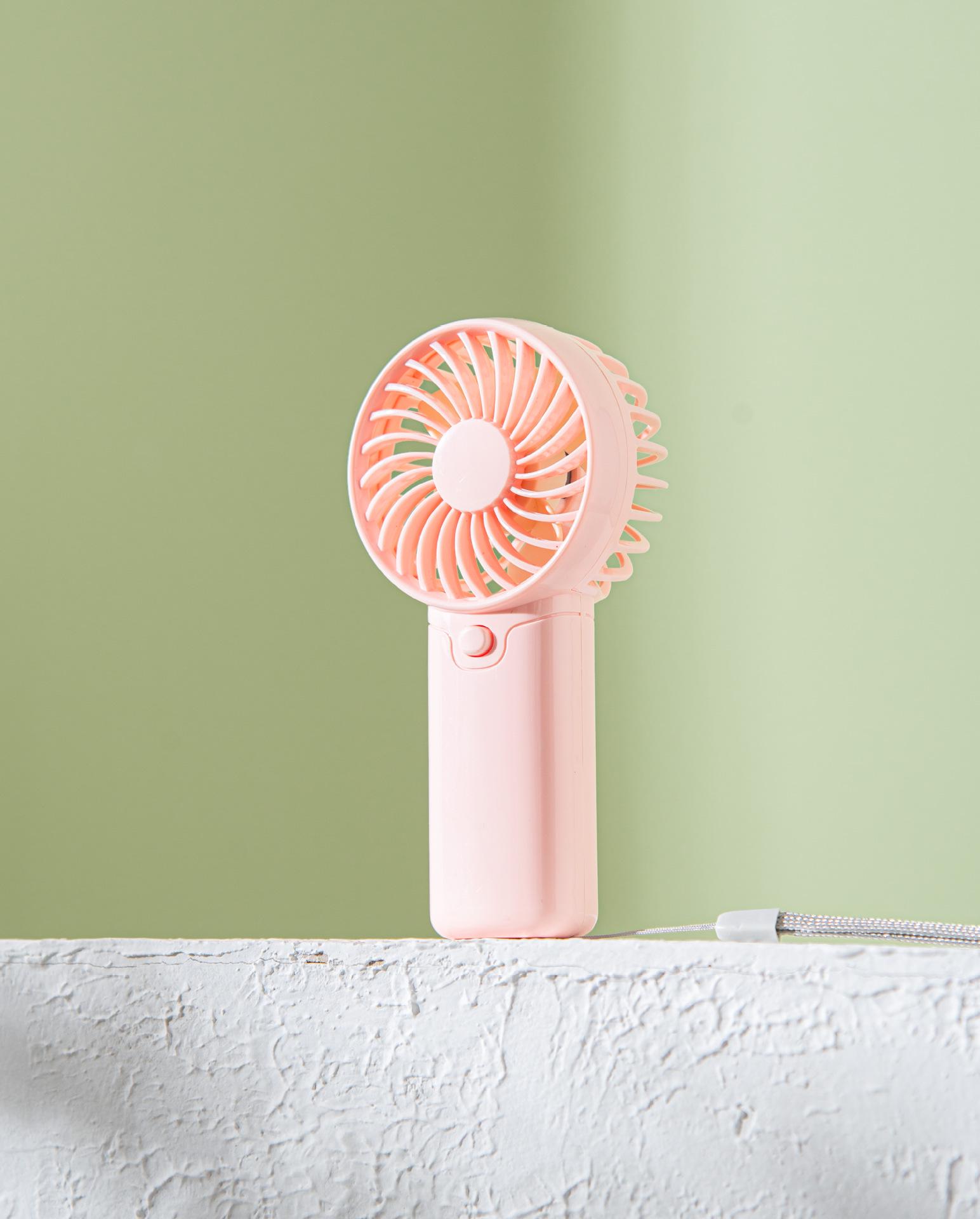 

Portable Mini USB Handheld Fan for Dorm, Office, and Outdoor Use