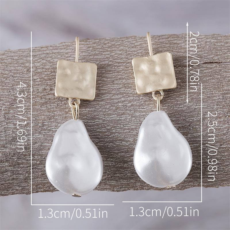 Boucles d'oreilles en perles baroques de mode classique