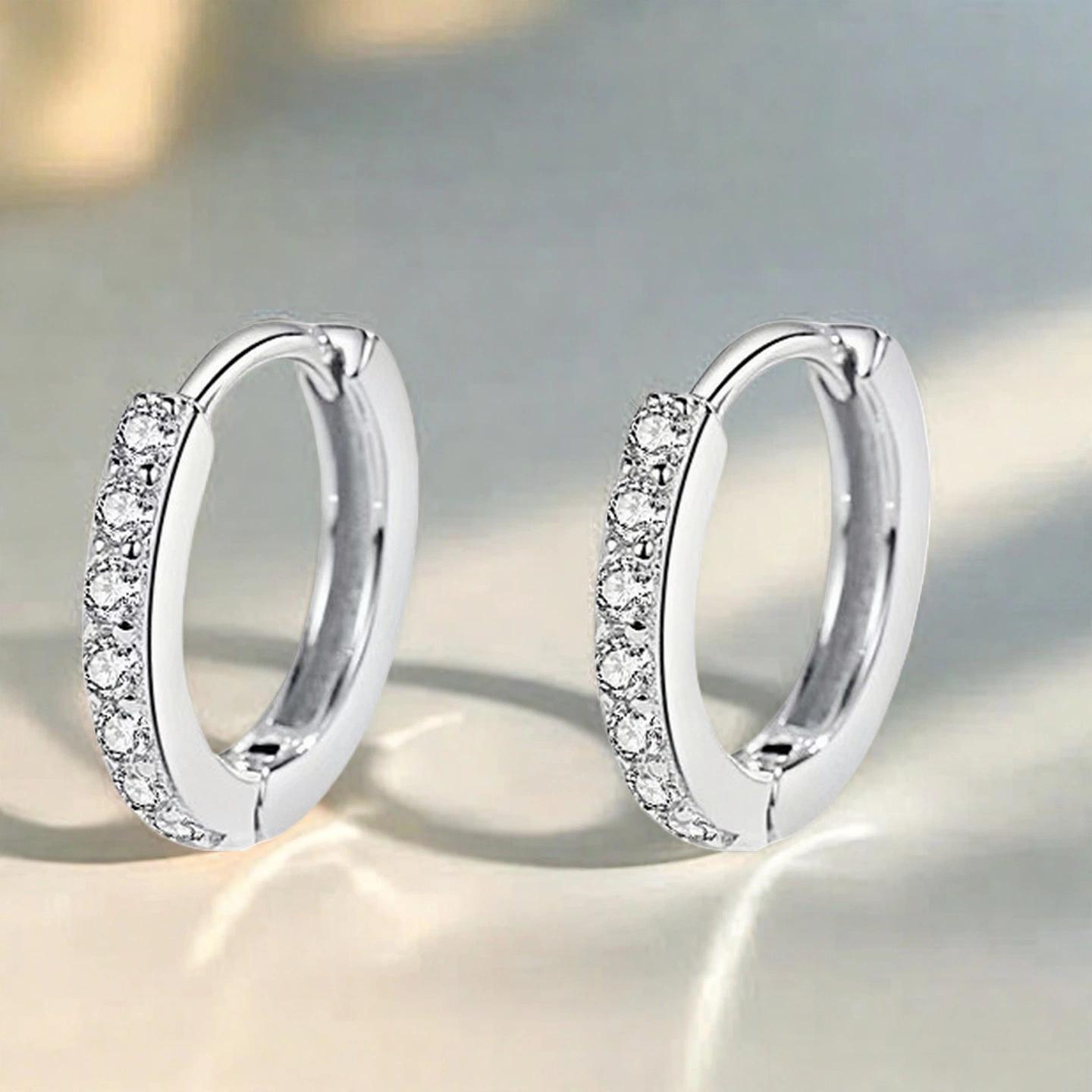 

Позолоченные медные серьги-каффы с подвесками из инкрустированного циркония