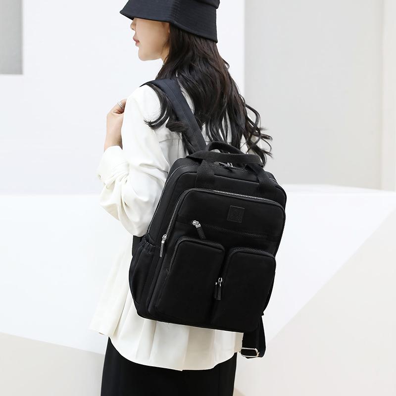 

Новий якісний жіночий рюкзак. Зносостійкий. Зносостійкий портативний нейлоновий рюкзак через плече. Дорожній рюкзак. чорний