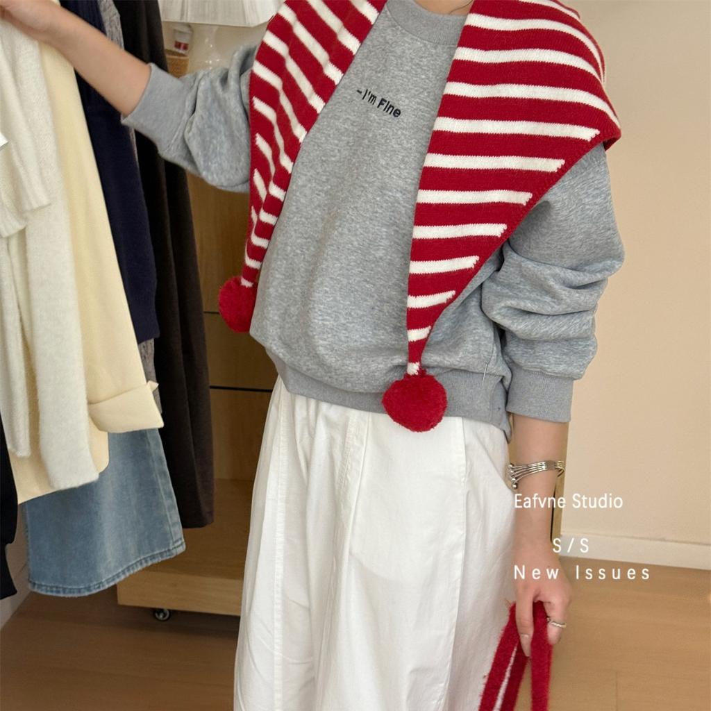 A Retro Hong Kong style Knitted Striped Pom pom with A Vintage Triangular Scarf Over It A Warm Autumn and Winter Decorative Shawl Scarf for Women