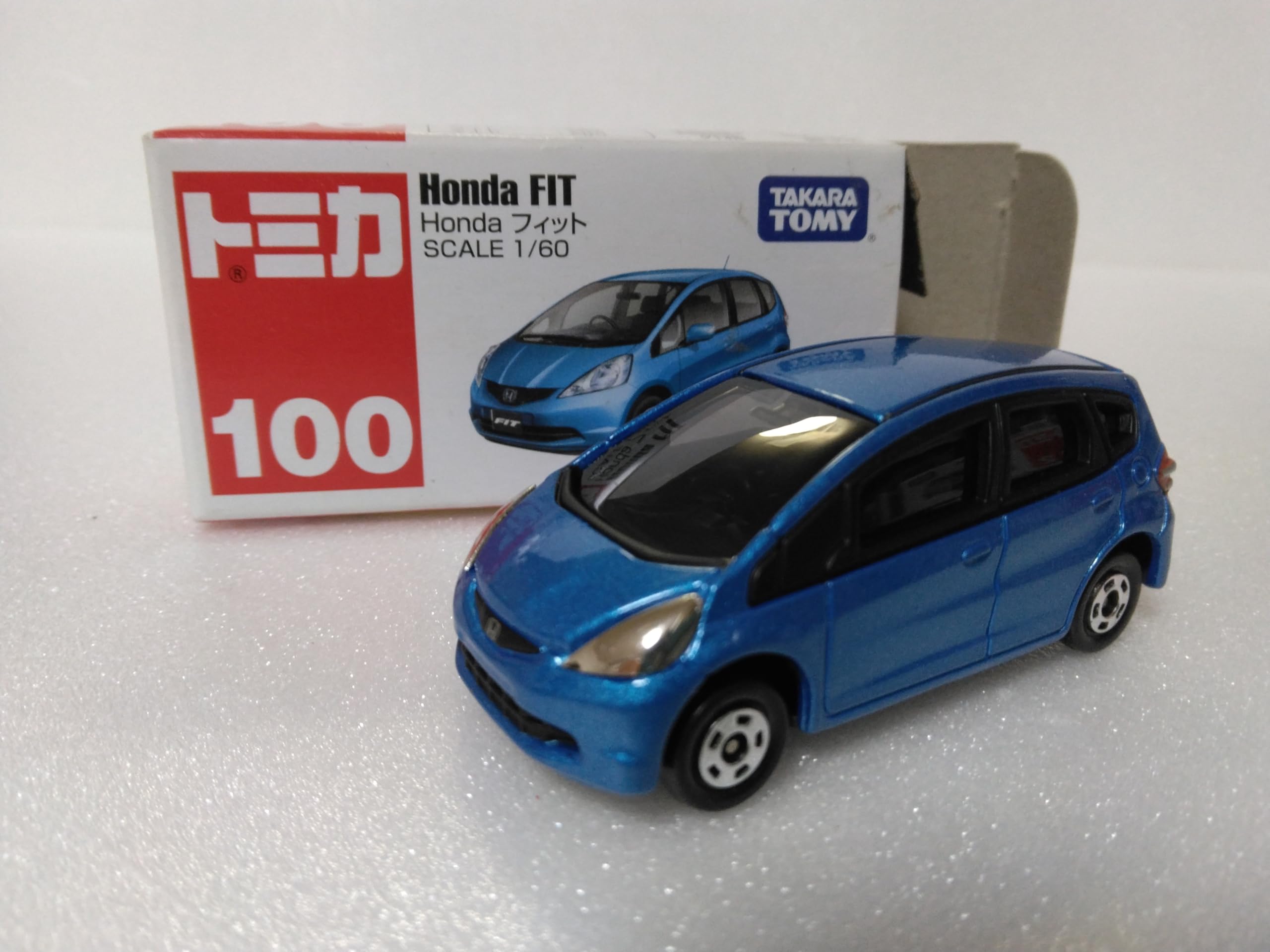 

Tomica №100 Honda Fit, масштаб 160, синий, с прозрачным футляром