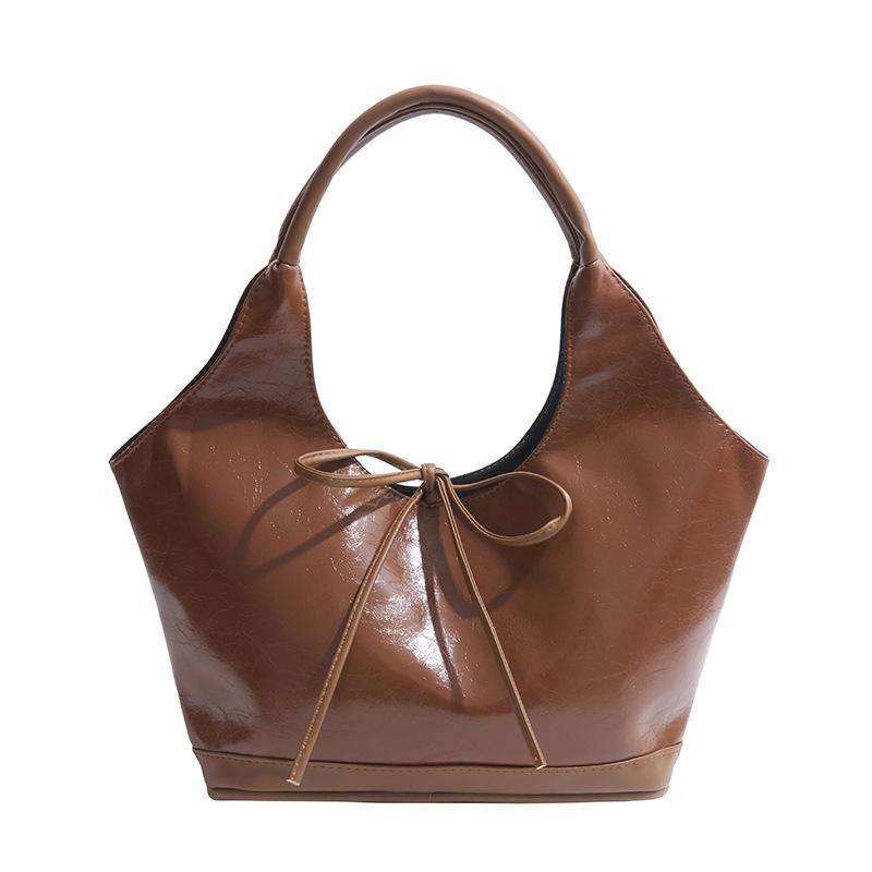 

Women s bag popular oil wax leather big bag 2025 new fashion retro underarm bag bow commuter tote bag коричневий