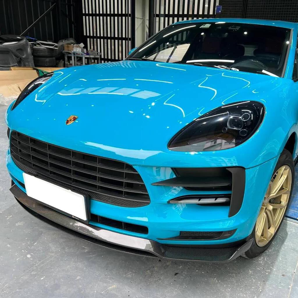 Porsche Macan Carbon Fiber Kit: AR Style Front Lip, Side Skirts, Rear Lip, and Corner Protectors.