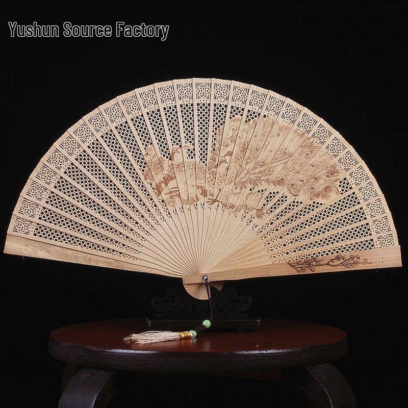 Antique-Style Chinese Sandalwood Folding Fan: Classic, Hollowed-Out Design for Women, Portable and Elegant.