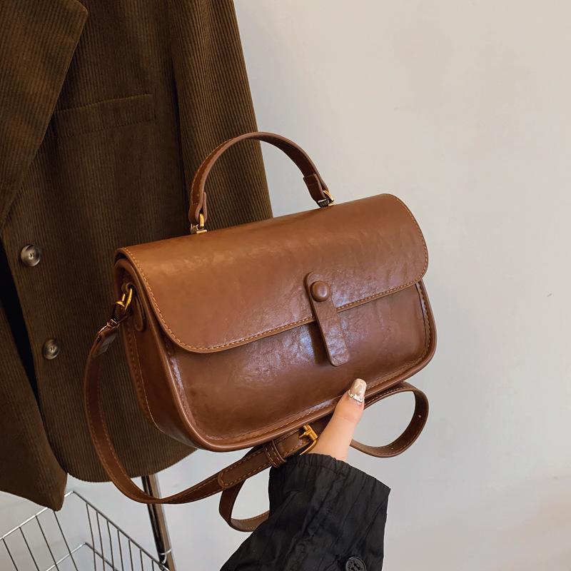 

Wholesale niche simple and versatile fashionable portable small square bag women s leisure commuting solid color shoulder messenger bag