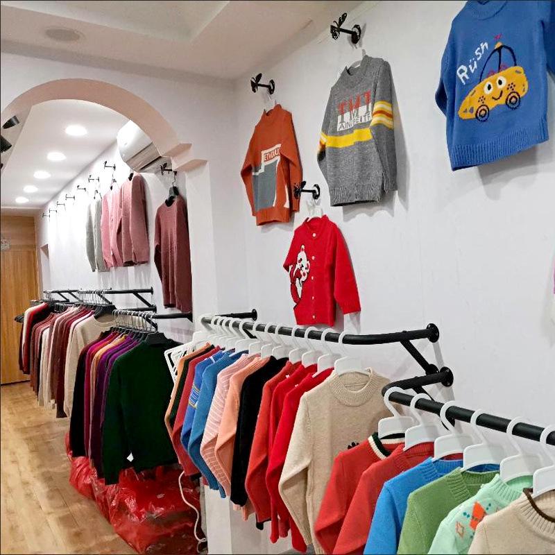Wall-Mounted Clothing Display Rack for Women's and Children's Wear Stores