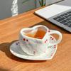Hand-squeezed hand-painted cherries, exquisite retro heart-shaped ceramic coffee cups and saucers, afternoon teacups