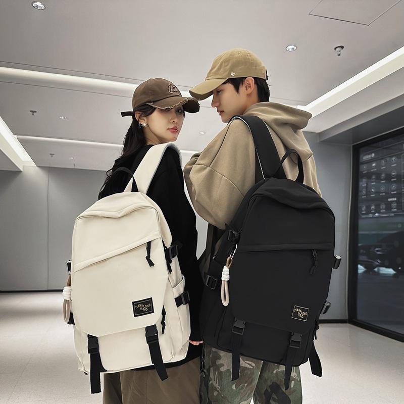 Schoolbag wholesale backpack trend simple outdoor couple backpack male large capacity junior high school high school college student schoolbag