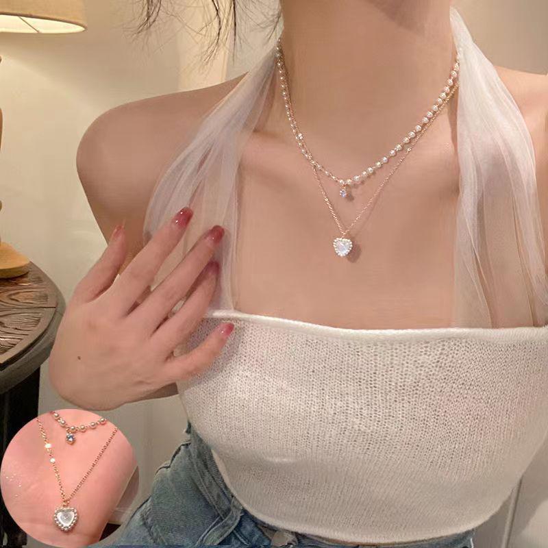 

Элегантное женское ожерелье с кисточками из жемчуга и бабочек — нишевый дизайн, универсальная цепочка на ключицу