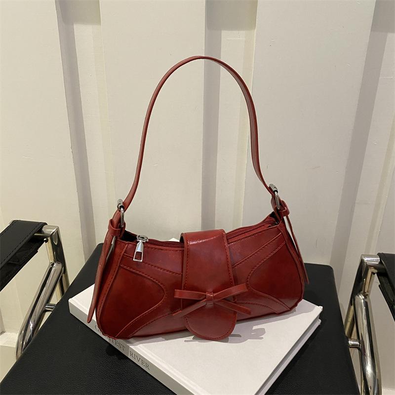 Silver small underarm bag women's 2025 new summer high-end French niche design baguette shoulder bag