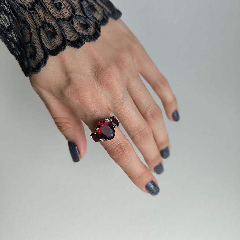Silberring mit natürlichem Granat 6,898ct, Gewicht des Artikels 4,63 g (2181330)