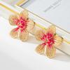 One Pair of Pink Enamel Five-Petal Flower Earrings with Pleated Design for Women.