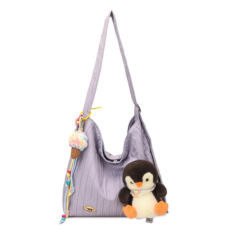 Casual large-capacity cartoon canvas bag women's 2025 new commuter versatile shoulder bag college student tote bag