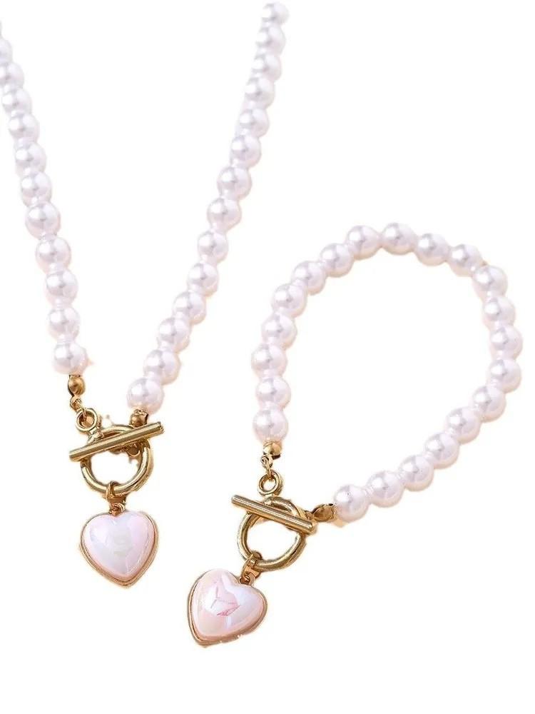 

Жемчужное колье-браслет с застежкой OT в форме сердца One Size золотой