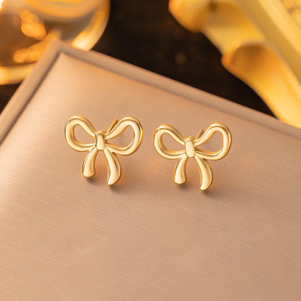Wen Jian Bow Tie Titanium Steel Stud Earrings: Trendy, Simple, Cool Style for Women 2023