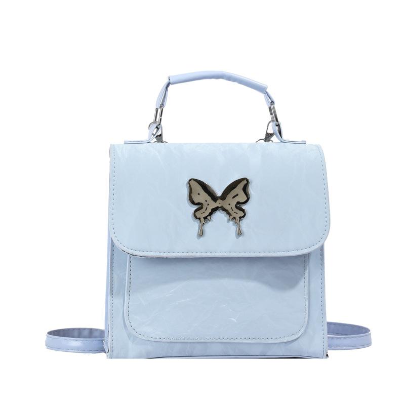 

Niche design bag women s 2024 spring new versatile backpack portable Korean version commuter messenger bag синій