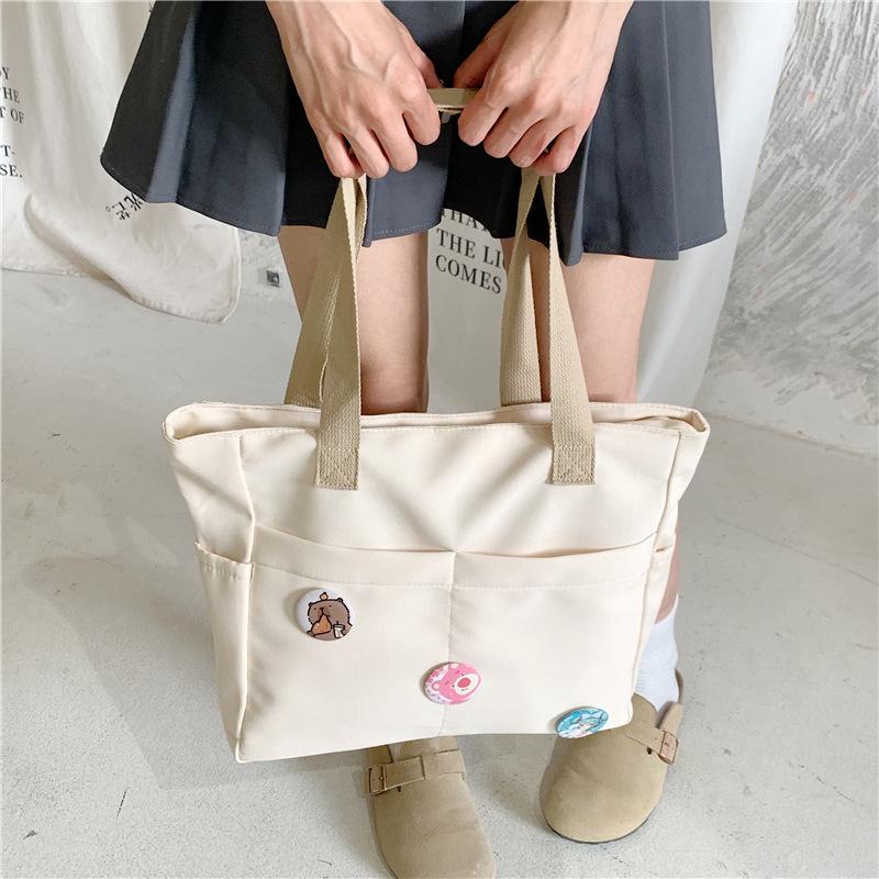 Japanese large-capacity canvas shoulder bag, light fashion trend women's business trip tote bag, commuter armpit bag