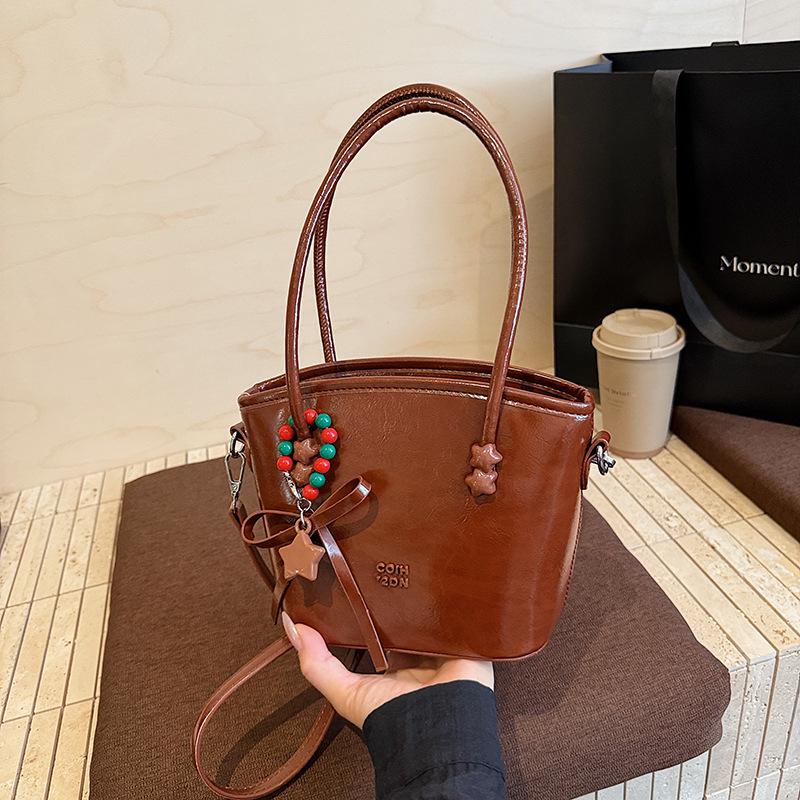 Innovative Sense Kleine Bucket Bag für Damen 2025 - Vielseitige Retro Umhängetasche mit einem Schulterriemen