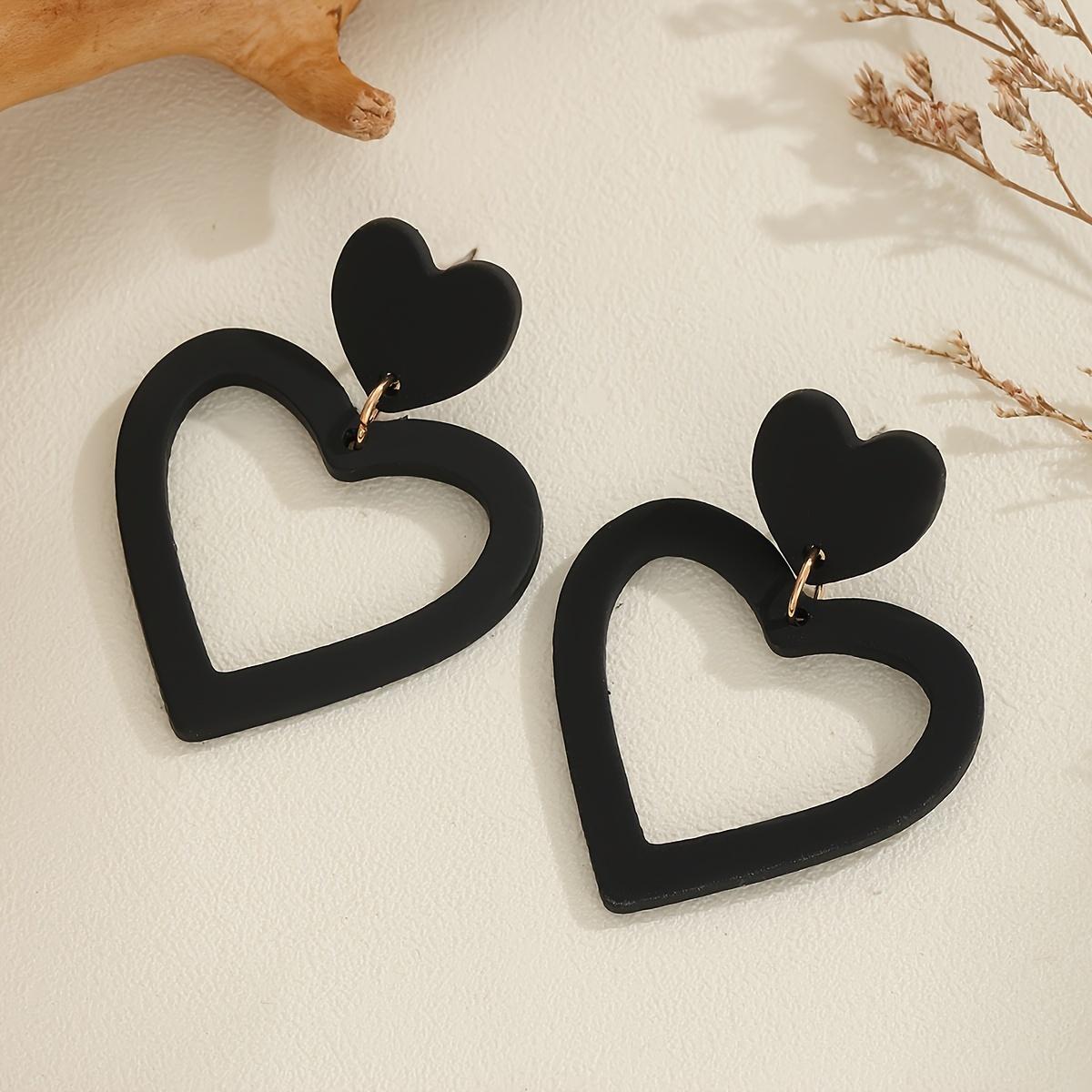 

Серьги-подвески в форме полого сердца чёрный