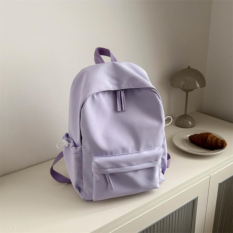 New solid color large-capacity simple casual Oxford cloth student class schoolbag men's and women's casual backpack
