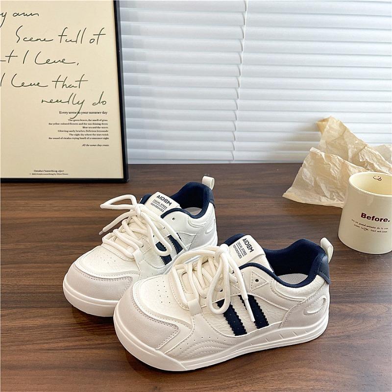 

Sports and leisure shoes, little white shoes, women s autumn new models with skirts, shoes, niche design, versatile board shoes 40 синій