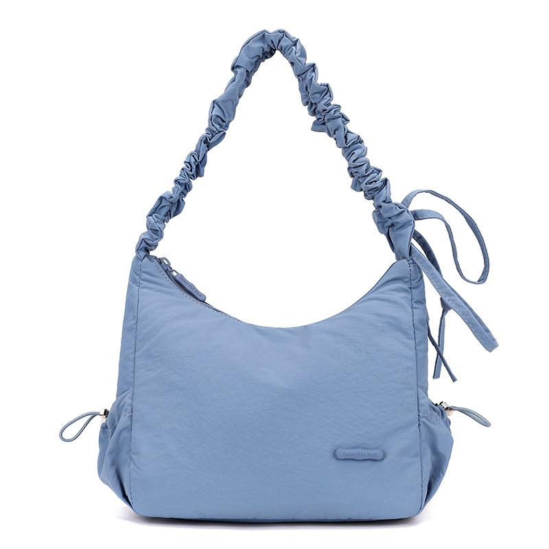 Niche design drawstring pleated bag solid color light and cute versatile shoulder bag