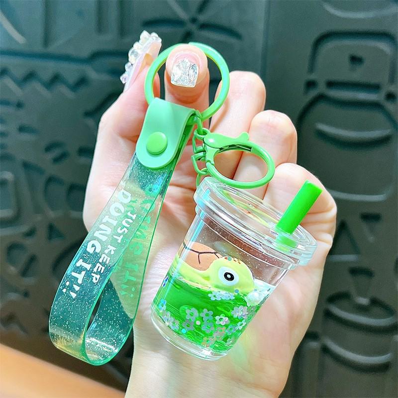 Exquisite Quicksand Panda Keychain: Cartoon Oil-Filled Doll Bag Pendant and Car Accessory