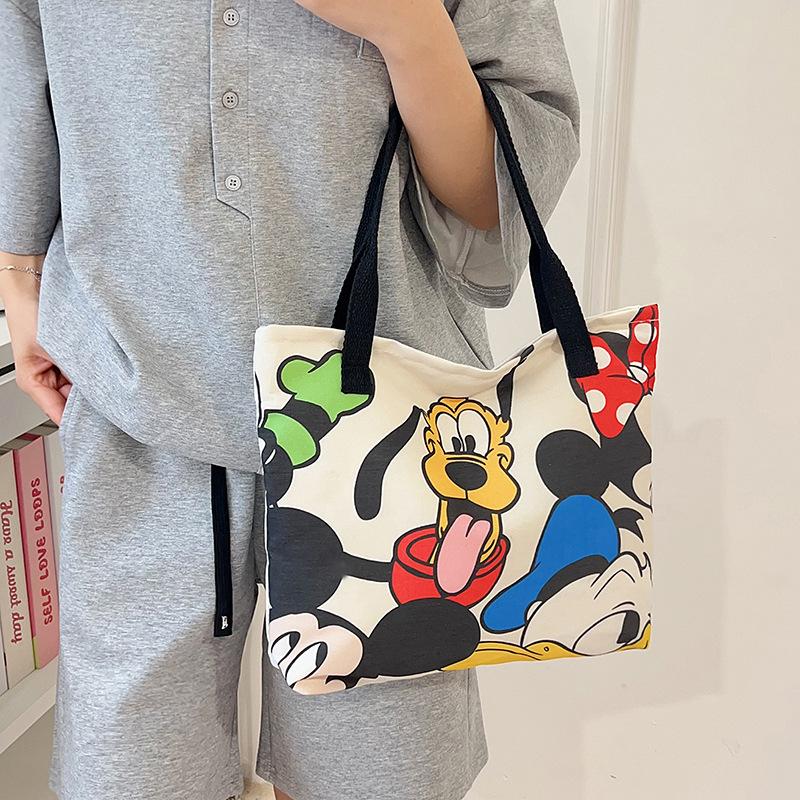 High-value canvas bag large-capacity cute cartoon interstellar baby student clothing book shoulder bag portable shopping bag female
