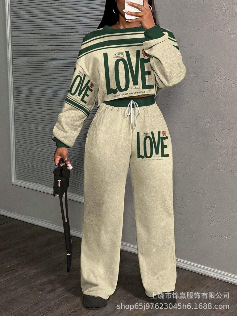 Tuta pantalone con maglione girocollo a fantasia stampata con lettere da donna, nuova tendenza autunno e inverno, tuta casual alla moda