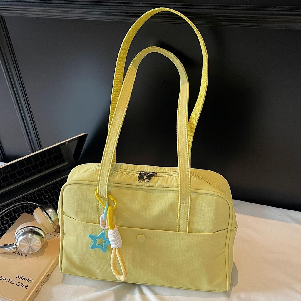 Korean version of simple large-capacity retro portable pillow bag women's 2025 new high-end texture foreign style shoulder armpit bag