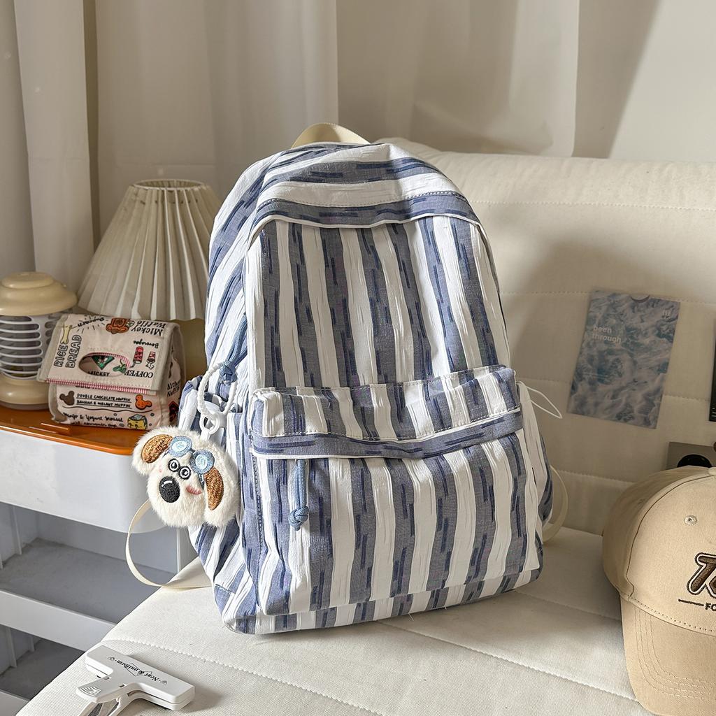 Schoolbag new 1011 high-value schoolbag ins wind lightweight backpack junior high school students versatile commuting large-capacity backpack