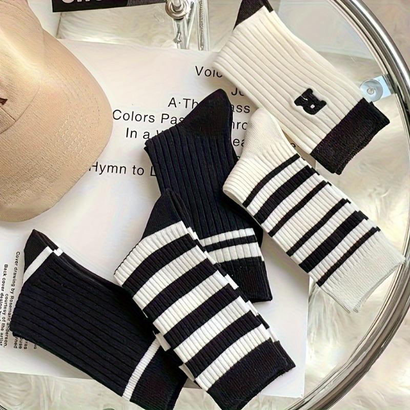 5 pairs of fashionable black and white mid tube socks, unisex, with black and white striped design